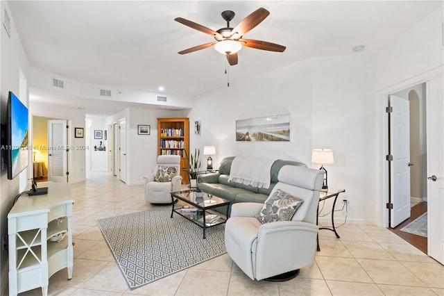 tiled living room featuring ceiling fan