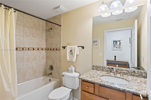 full bathroom featuring vanity, toilet, and shower / tub combo