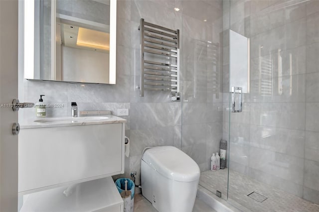 bathroom with radiator heating unit, vanity, toilet, and tile walls