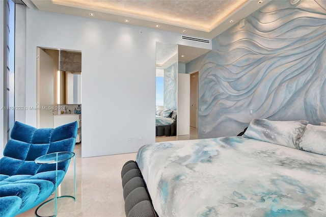 bedroom featuring a tray ceiling