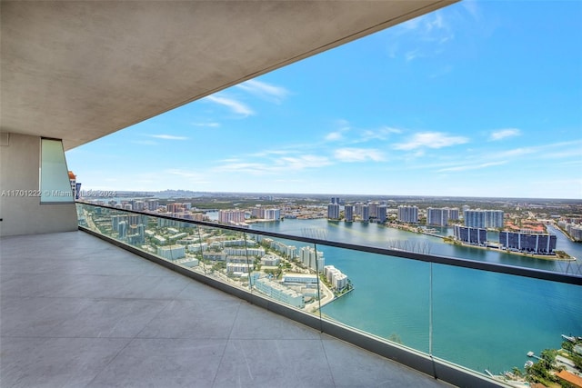 balcony featuring a water view