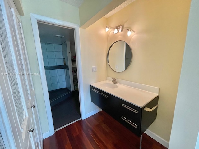 bathroom with wood-type flooring and vanity