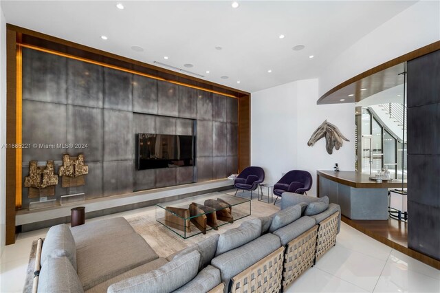 271 N Hibiscus Dr, Miami Beach, FL 33139 - tiled living area featuring recessed lighting and stairway