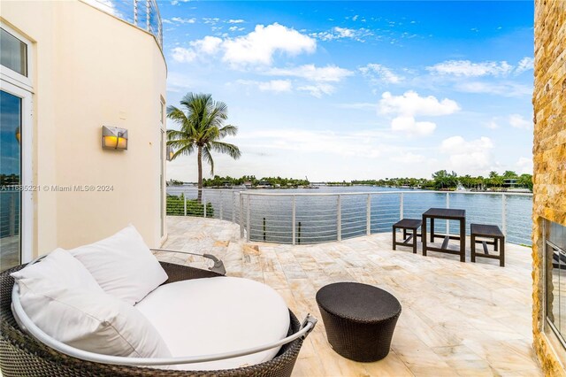 271 N Hibiscus Dr, Miami Beach, FL 33139 - view of patio / terrace featuring a water view