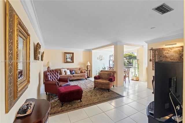 living room with light tile patterned floors and ornamental molding