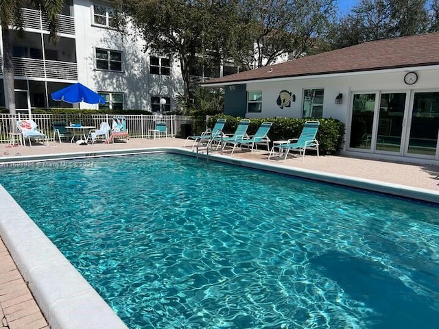 view of pool featuring a patio