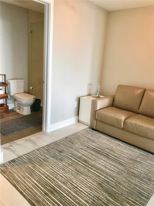 2900 NE 7th Ave Unit 3608, Miami, FL 33137 - living area featuring baseboards and marble look tiles