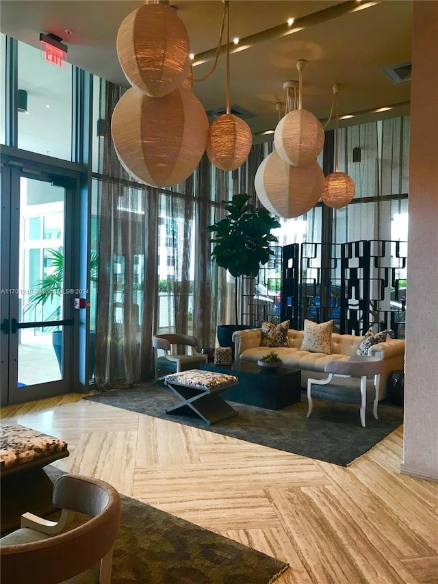 2900 NE 7th Ave Unit 3608, Miami, FL 33137 - building lobby featuring expansive windows and a towering ceiling