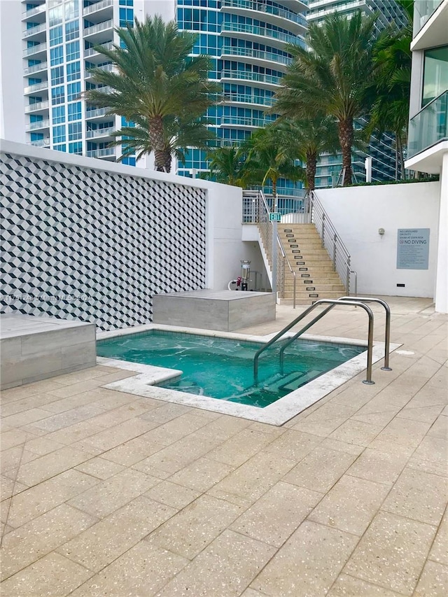2900 NE 7th Ave Unit 3608, Miami, FL 33137 - view of swimming pool with a patio area and stairs