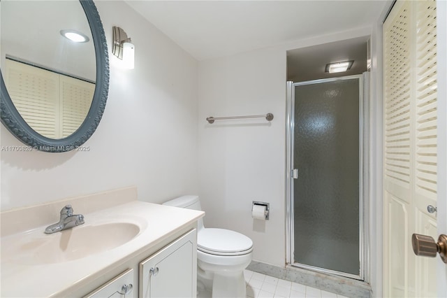 1865 S Ocean Dr Unit 16J, Hallandale Beach, FL 33009 - full bathroom with vanity, toilet, tile patterned floors, and a stall shower