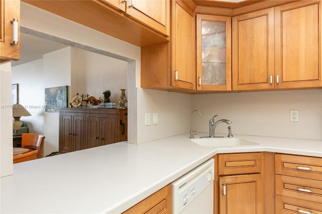 kitchen featuring dishwasher and sink