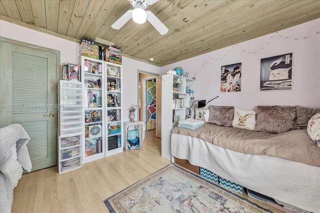 bedroom featuring wood ceiling, ceiling fan, and wood-type flooring