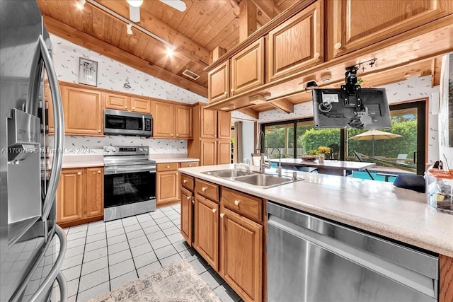 kitchen with stainless steel appliances, wood ceiling, plenty of natural light, and light tile patterned flooring