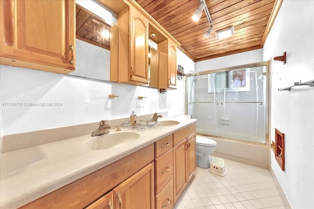 full bathroom with wooden ceiling, tile patterned flooring, toilet, shower / bath combination with glass door, and vanity