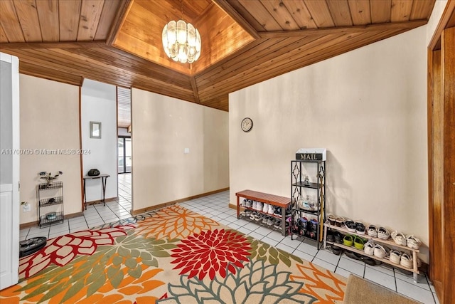 sitting room with light tile patterned floors, vaulted ceiling, and wooden ceiling