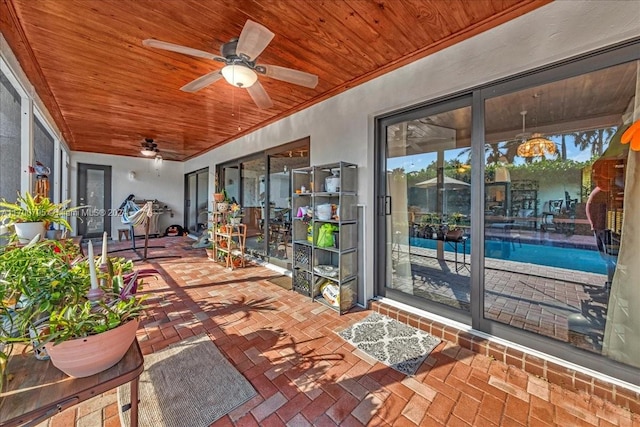 view of patio with ceiling fan