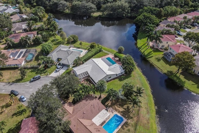 drone / aerial view with a water view