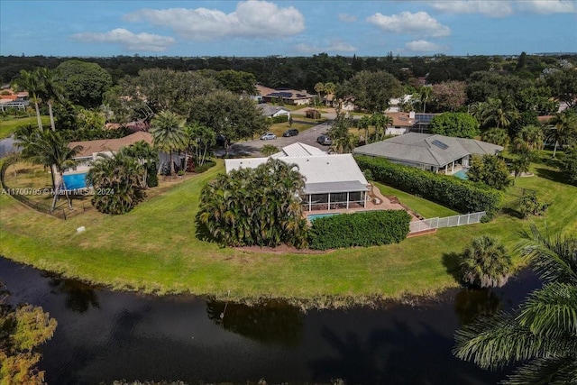 birds eye view of property featuring a water view