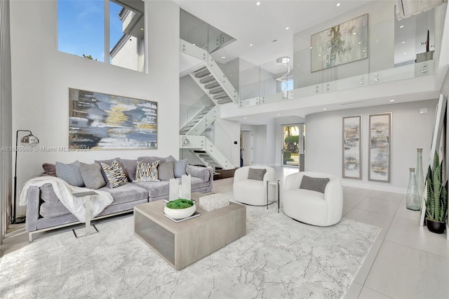 tiled living room with a towering ceiling