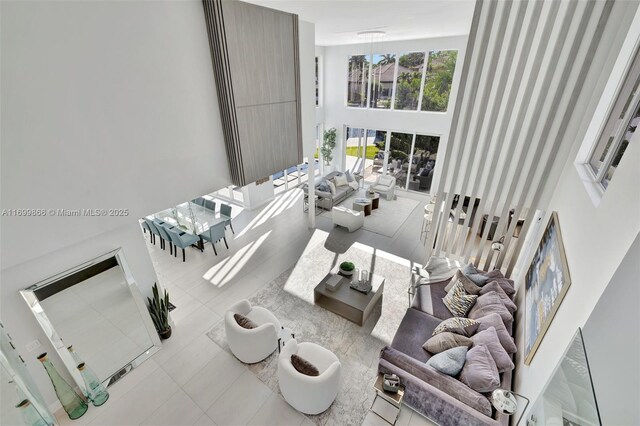 stairway featuring hardwood / wood-style floors and a wealth of natural light