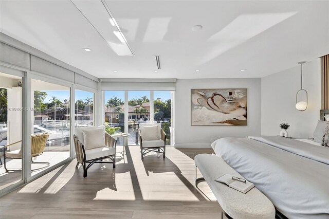 bedroom with light hardwood / wood-style flooring