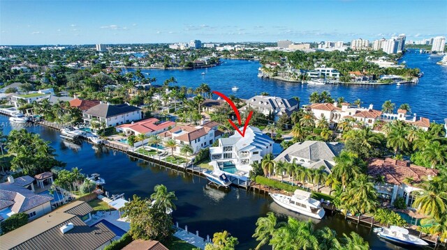 drone / aerial view with a water view