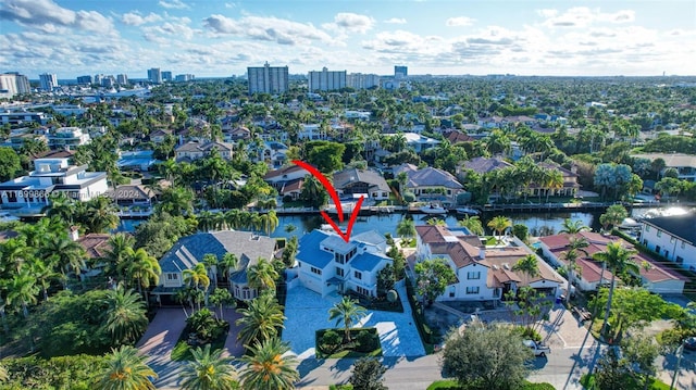 birds eye view of property featuring a water view