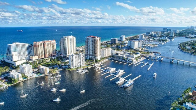 birds eye view of property featuring a water view