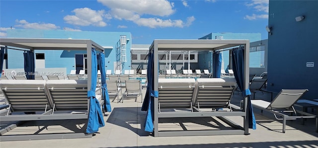 exterior space featuring a gazebo and an outdoor hangout area