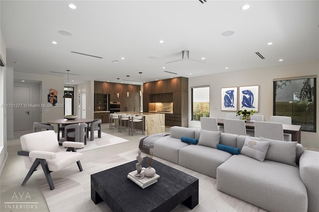 living room featuring recessed lighting