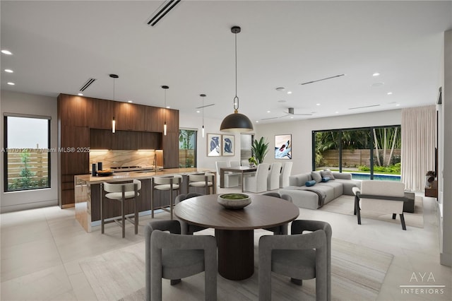 dining area featuring light tile patterned floors, visible vents, and recessed lighting