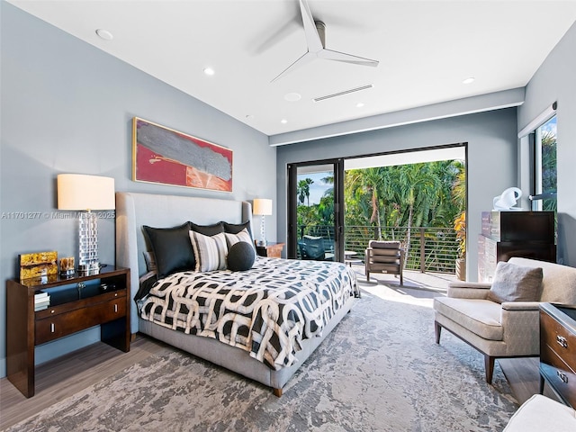 bedroom with access to exterior, visible vents, wood finished floors, and recessed lighting