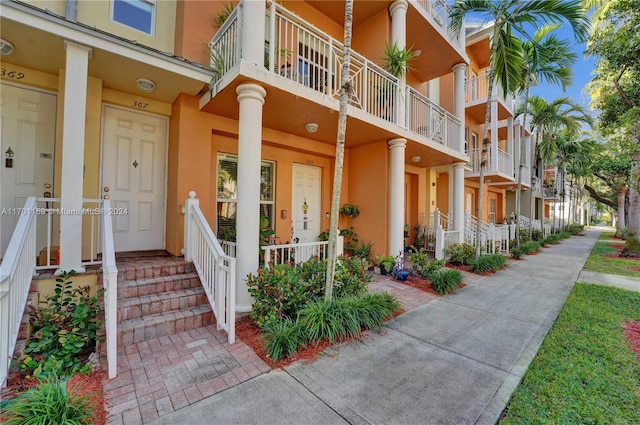 doorway to property featuring covered porch