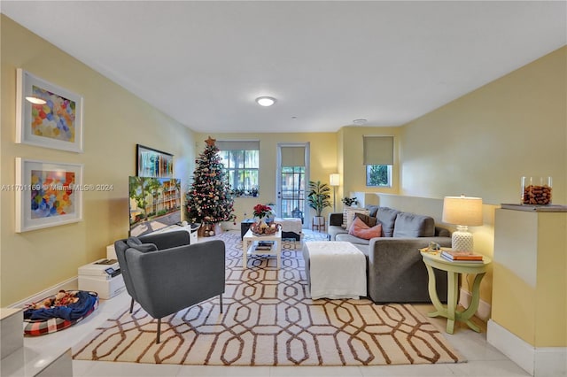 living room with light tile patterned floors