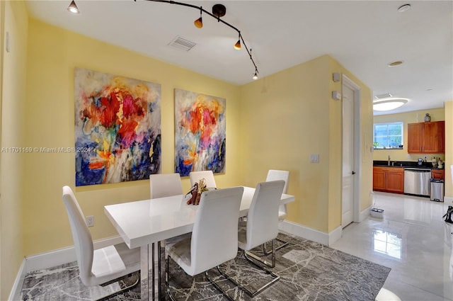 dining space with sink