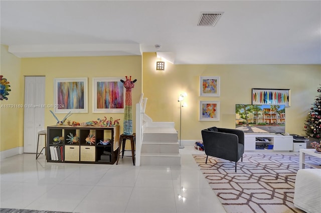 living room featuring light tile patterned flooring