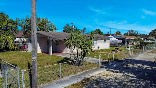 view of front of property with a front yard