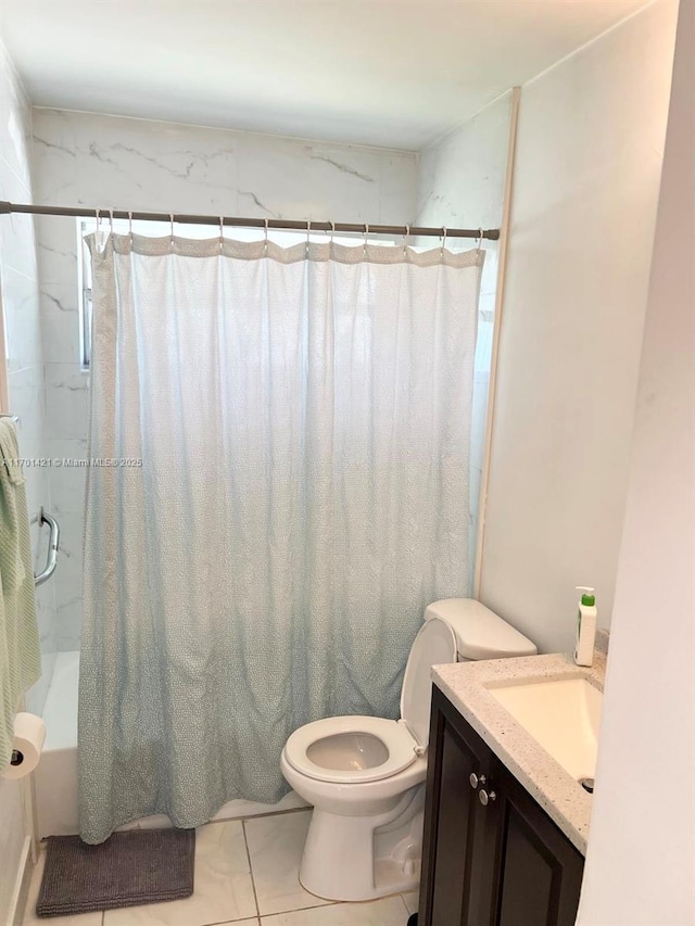 full bathroom featuring tile patterned floors, vanity, toilet, and shower / tub combo with curtain