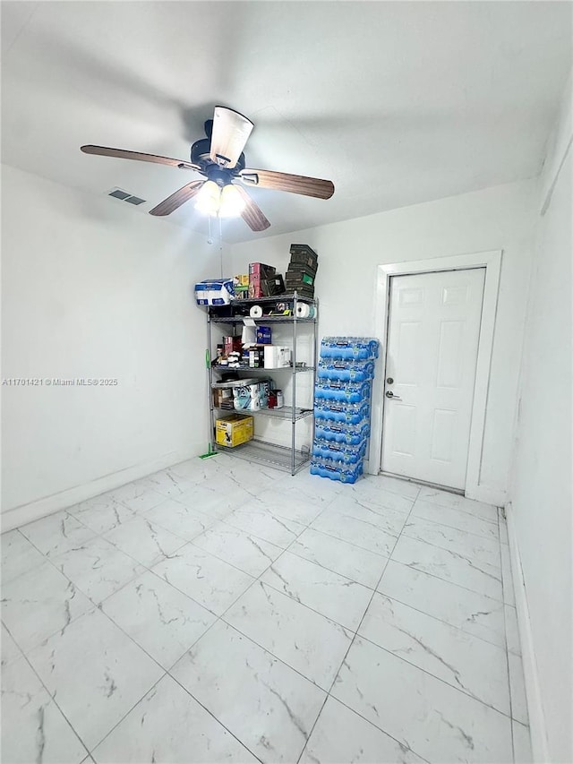 garage with ceiling fan