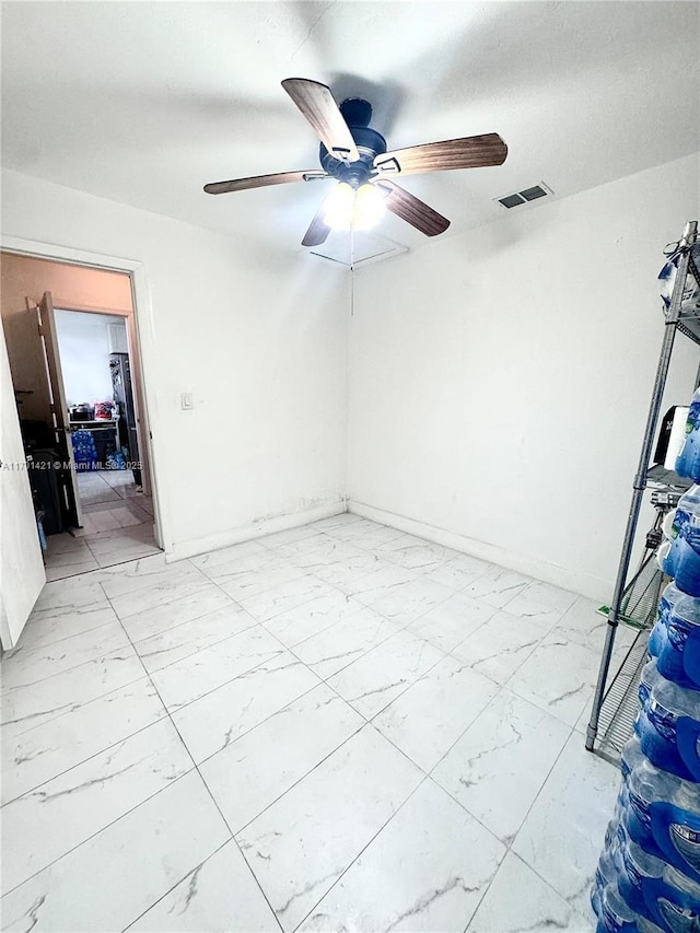 unfurnished room featuring ceiling fan