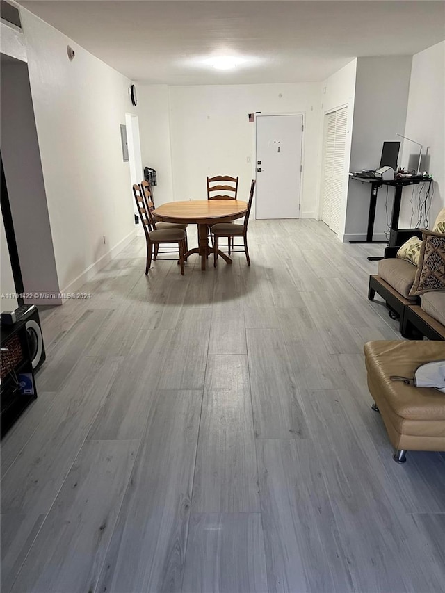 dining room featuring light hardwood / wood-style floors