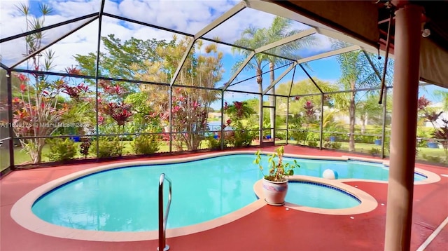 view of pool with a lanai