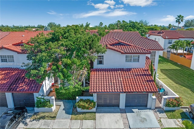 20935 SW 84th Ave Unit 20935, Cutler Bay, FL 33189 - view of front facade with a tiled roof, stucco siding, and concrete driveway