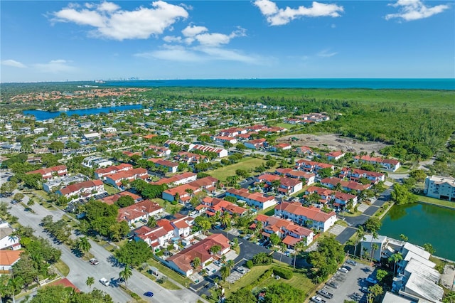 drone / aerial view featuring a water view