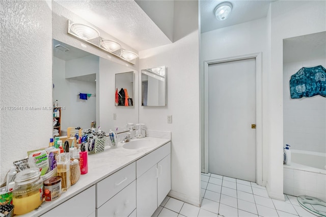 20935 SW 84th Ave Unit 20935, Cutler Bay, FL 33189 - bathroom featuring vanity, tile patterned floors, and tiled tub