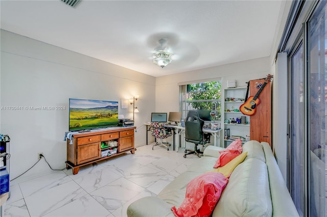 living room featuring ceiling fan