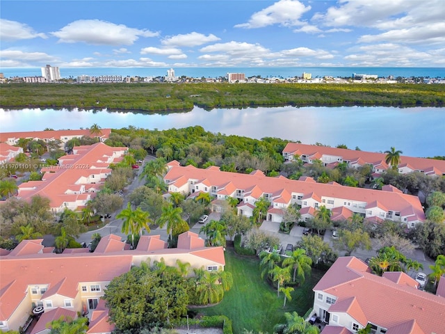 bird's eye view with a water view