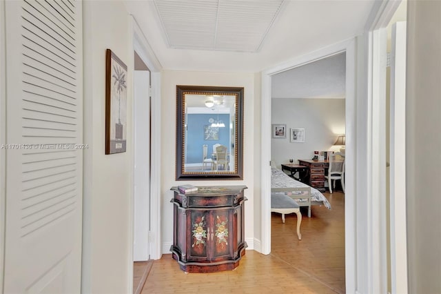 hall with wood-type flooring