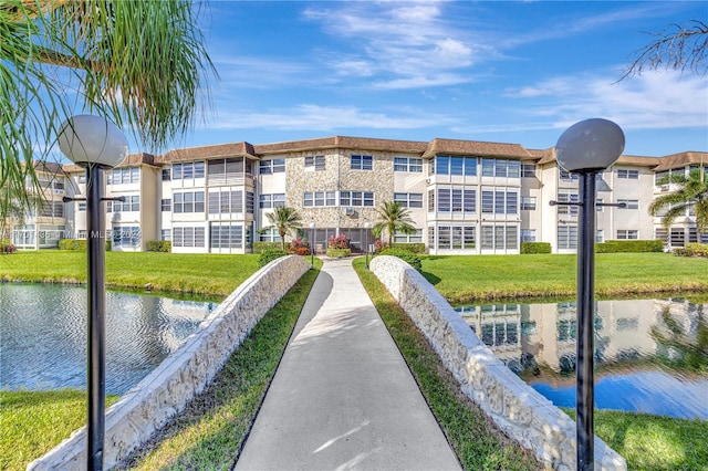 view of building exterior with a water view