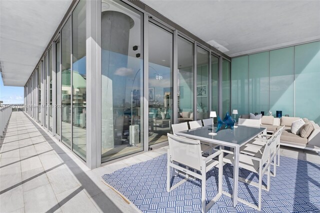 2675 S Bayshore Dr Unit 1602S, Miami, FL 33133 - dining space featuring floor to ceiling windows